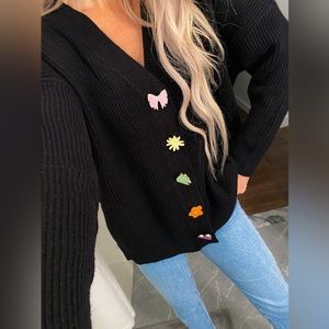 OLIVIA RUBIN Black Ribbed Cardigan with Colorful Floral Buttons